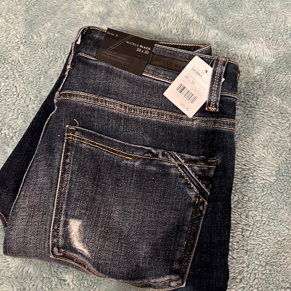 Buckle Black High Rise Distressed Skinny Jeans